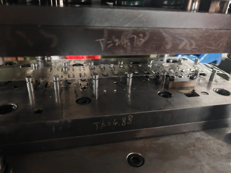 Stamping Process Considerations for Metal–Plastic Composite Structures