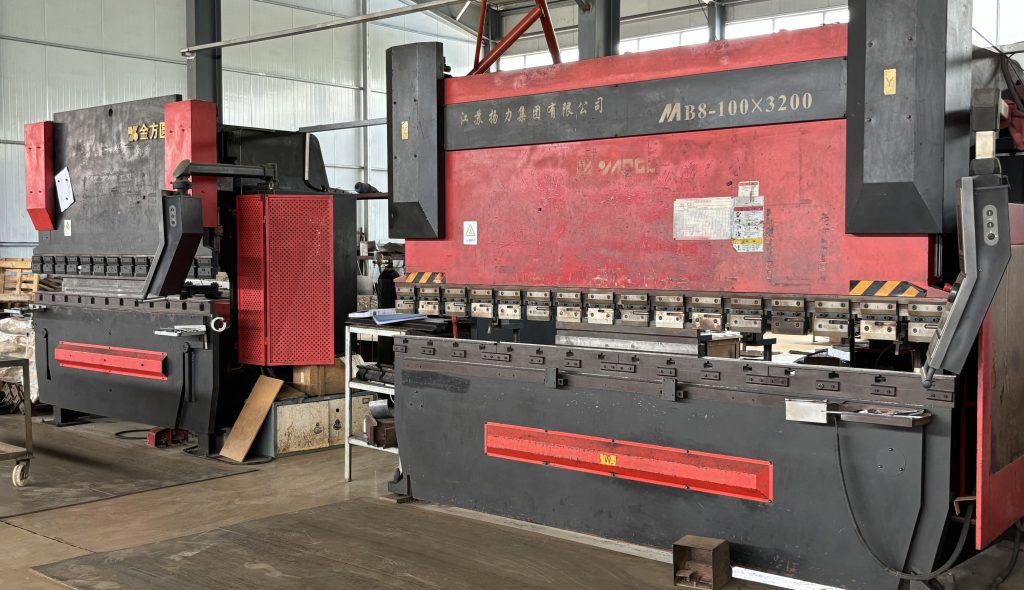 Two bending machines in a sheet metal processing factory specializing in welding