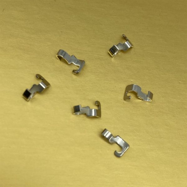 Nickel-plated contact made using die design in stamping